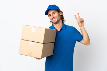 Delivery man isolated on white background smiling and showing victory sign