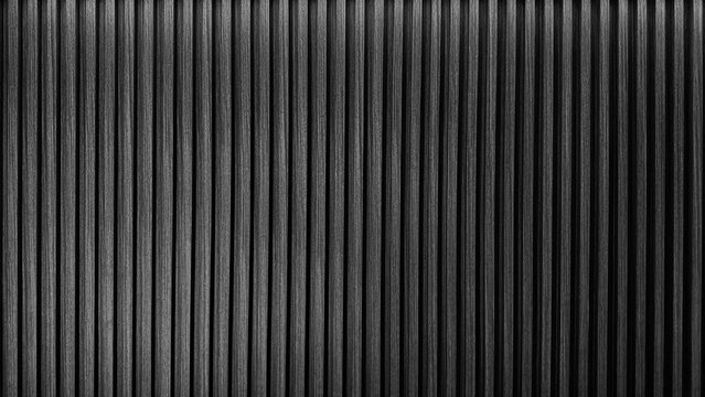 black striped wooden slats wall texture with vertical lines and, modern abstract background for design. wood slats with lighting from above use as background.