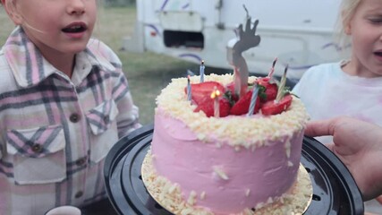 Celebrating the birthday of a little daughter in a mobile home