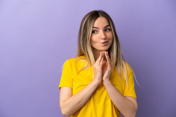 Young woman over isolated purple background scheming something