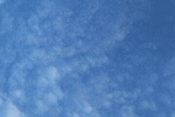 A Beautiful Azure Sky Dotted with Fluffy White Clouds Showing Natural Beauty