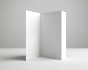 Closed minimalist trifold brochure mockup upright next to geometric concrete architectural model on a clean white background. Sharp shadows, flyer mock-up template for branding.