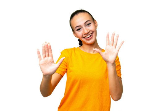 Young Arab woman over isolated background counting ten with fingers