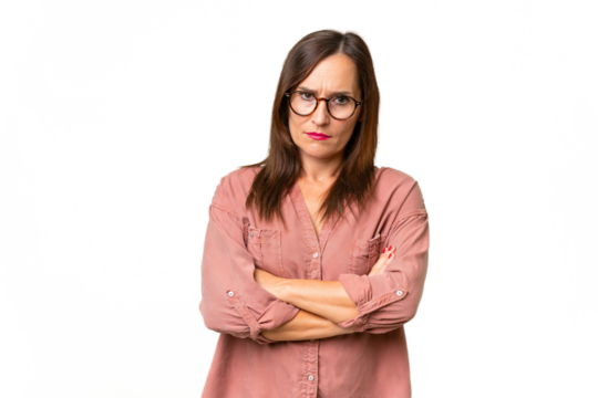 Middle-aged caucasian woman over isolated background with unhappy expression