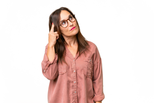 Middle-aged caucasian woman over isolated background with problems making suicide gesture