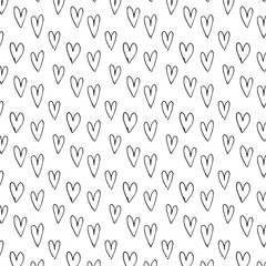Fototapeta premium Black heart seamless pattern. Black and white ink brush hearts hand drawn ornament. 