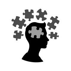 Silhouette of person surrounded by puzzle pieces symbolizing mental clarity and concept of psychological support, psychotherapy, consultations, self-improvement  