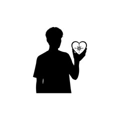 Silhouette of person holding compass in heart shape representing emotional guidance  