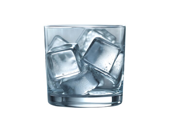 A glass filled with several ice cubes inside it