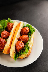 Meatball sandwich fast food meat dish fresh delicious gourmet food background on the table rustic food top view copy space