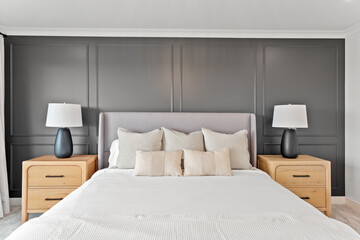 Large bed with white sheets