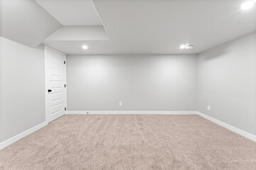 White room with a door and a window