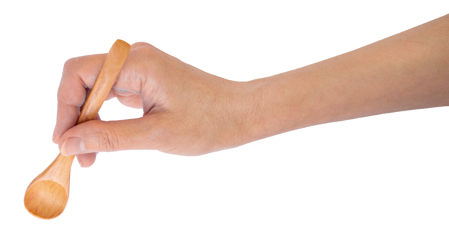 Close up image of female hand holding wooden spoon, perfect for promotional materials or food design projects. PNG