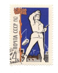 A vintage postage stamp from Russia isolated on a white background.