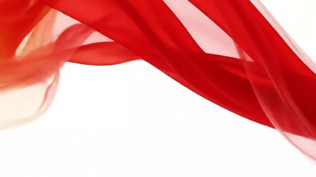 A diagonal swathe of translucent red fabric flows across a white background.
