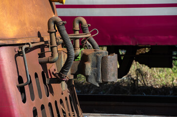The mechanism of coupling of train cars close up, coupling of railway cars, wagon connection