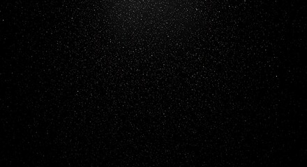 A dark, textured black background with subtle speckles of light