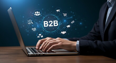 A businessman is typing on a laptop with b2b business to business marketing strategy icons, representing digital transformation and connection