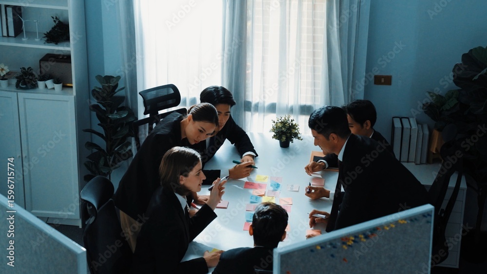 Canvas Prints top view of smart business people brainstorm financial plan by using sticky notes at meeting while b
