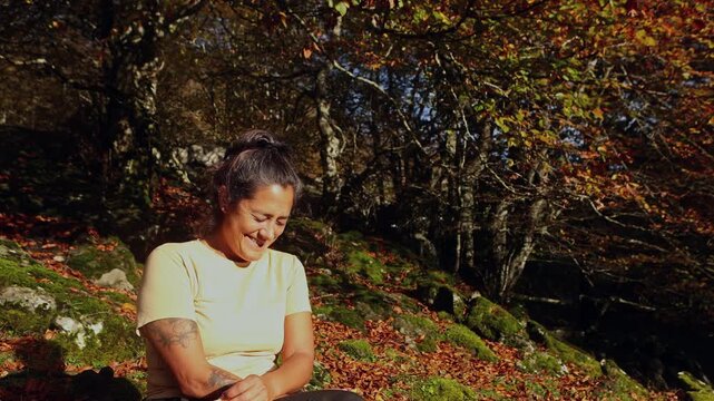 Woman resting during hike in Gorbea Natural Park