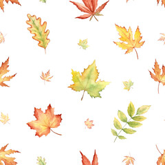 Fall pattern with watercolorautumn leaves in soft orange and green tones.