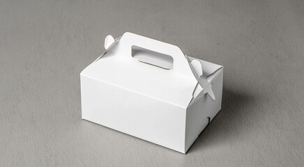 Blank white gable box with handle on a gray background