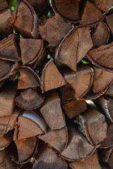 Natural wood texture with stack of chopped firewood