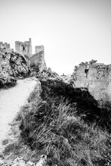 Italy, July 5, 2025: Ruins of Rocca Calascio Castle, an Italian tourist destination and landmark in the Gran Sasso National Park, L'Aquila, Abruzzo. Clear blue skies at .