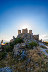Obraz premium Italy, July 5, 2025: Ruins of Rocca Calascio Castle, an Italian tourist destination and landmark in the Gran Sasso National Park, L'Aquila, Abruzzo. Clear blue skies at .