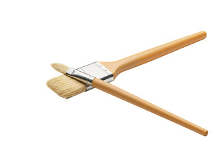 Two paintbrushes with wooden handles and metal ferrules are arranged on a black background