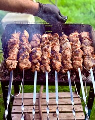barbecue and grilled corn with cheese and lime on plate