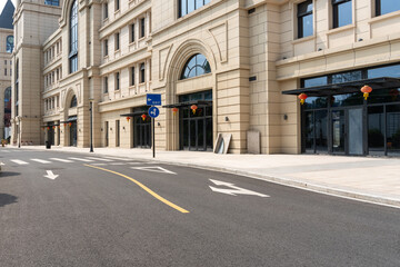 Fototapeta premium empty road with traditional buildings