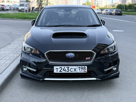 Subaru Levorg 2.4 STI Sport R EX 4WD black color parked on street. Exterior of a black Subaru WRX Wagon on parking lot. Subaru Levorg STI Sport EyeSight 4WD Japanese sport car. 