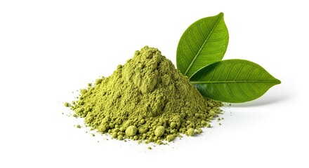 A vibrant pile of finely ground green powder sits beside fresh green leaves on a clean white background