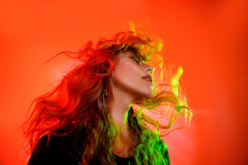 Vibrant portrait of a woman with dynamic lighting