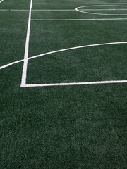 Obraz premium Close-Up of Soccer Field With White Markings on Green Grass Surface