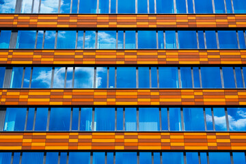 Office building with orange and brown horizontal panels