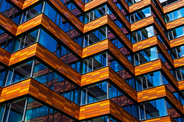 Office building with orange and brown horizontal panels
