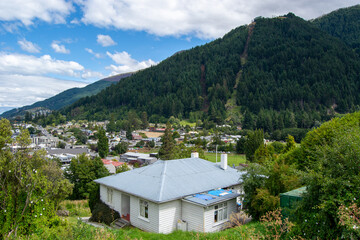 Scenic Town View Surrounded by Lush Mountains
