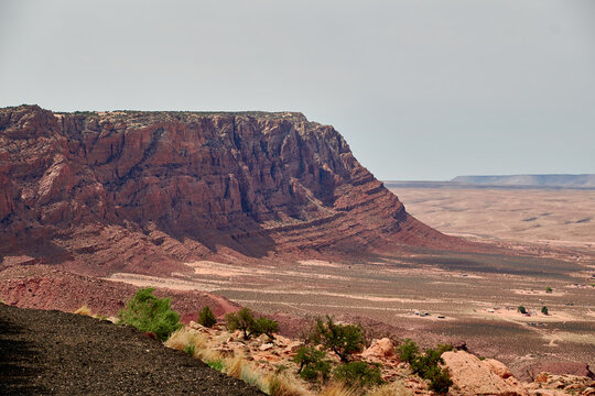 A view on U.S. Highway 89 of rugged cliffs at the edge of a plateau near Vermillion Cliffs Nation Mounument in the desert of northern Arizona.