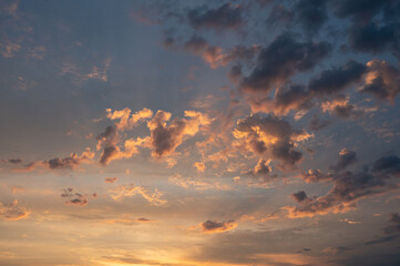 Sunset sky with soft clouds as background.