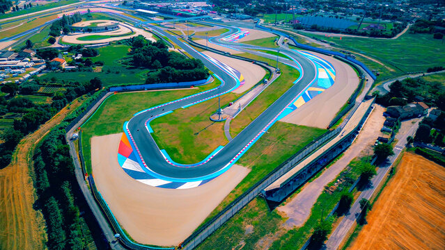 Driving school. Aerial view of the race track open for motorcycle training. Asphalt road. Drone footage. Group of motorcyclists on motorcycles. Motorsport. Italy, Misano, 21.07.2024