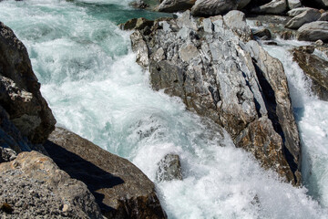 Rushing Water Over Rocky Terrain
