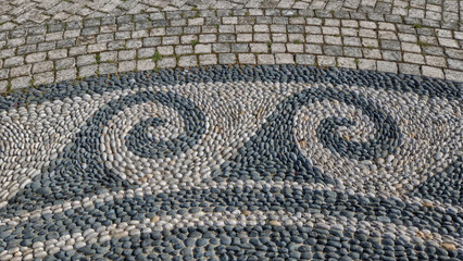 background of landscaping work lined with sea pebbles