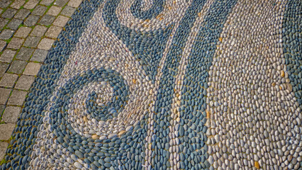 background of landscaping work lined with sea pebbles