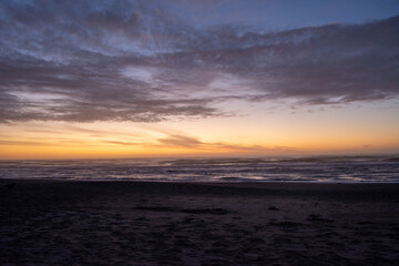 Serene Beach Sunset with Vibrant Sky Colors