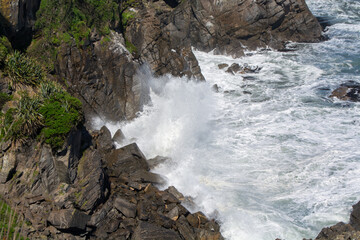 Waves Crashing on Rocky Coastline