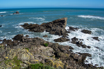 Scenic Coastal View with Rugged Rocks and Waves