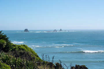 Serene Coastal View with Rocky Outcrops
