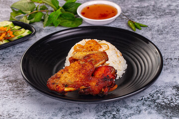 Spicy roasted chicken wing with rice